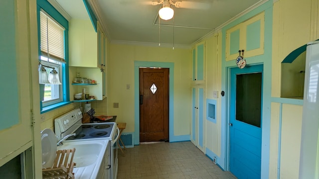 kitchen featuring white cabinetry, electric stove, ceiling fan, and light tile floors