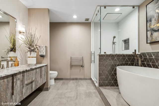 full bathroom with vanity, plus walk in shower, toilet, and concrete flooring