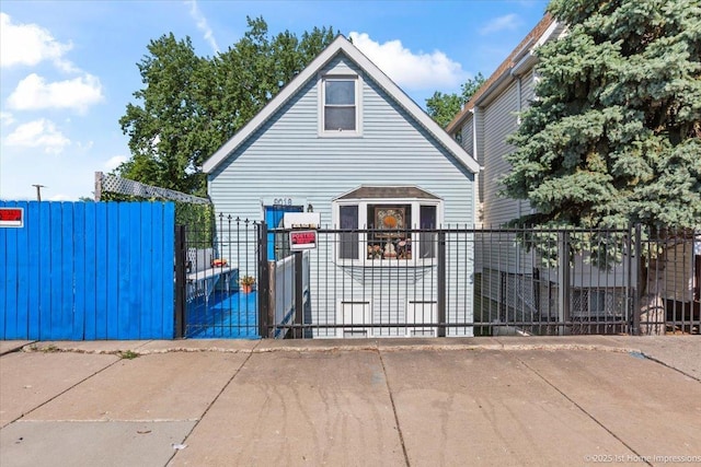 9018 S Brandon Ave, Chicago, IL 60617 - view of front of house with a gate