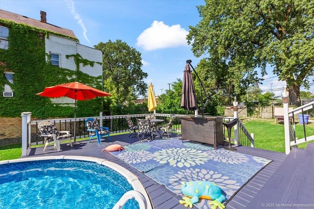 9018 S Brandon Ave, Chicago, IL 60617 - view of swimming pool featuring a wooden deck and outdoor dining space