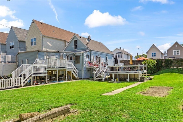 9018 S Brandon Ave, Chicago, IL 60617 - back of house featuring stairs and a wooden deck
