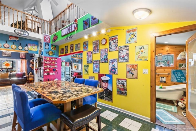 9018 S Brandon Ave, Chicago, IL 60617 - rec room with baseboards and tile patterned floors
