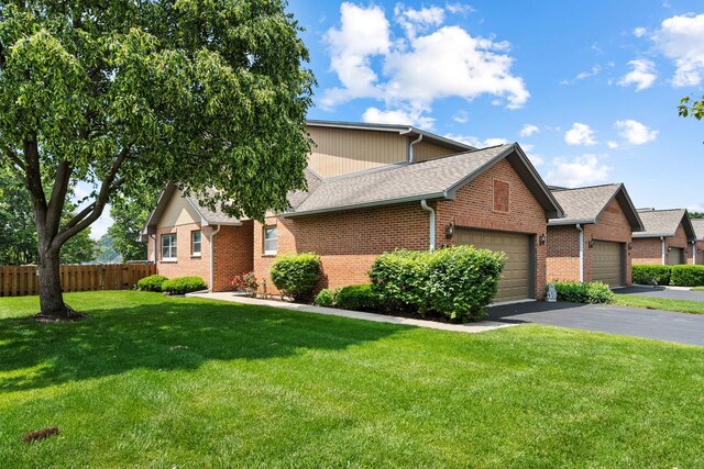 182 Ashley Way, Bloomingdale, IL 60108 - view of front of home featuring an attached garage, brick siding, asphalt driveway, and a shingled roof