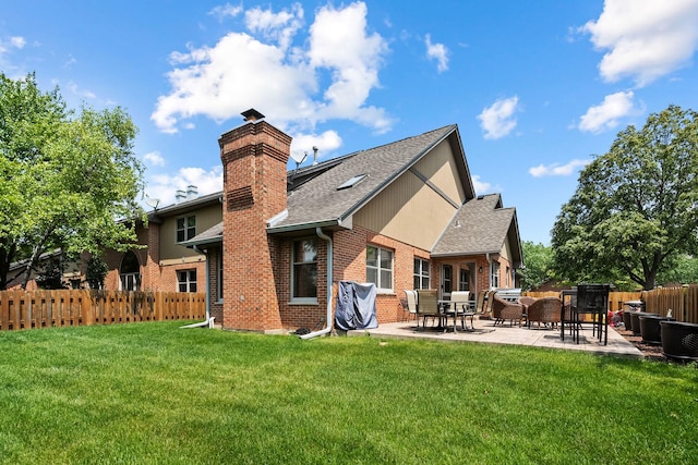 182 Ashley Way, Bloomingdale, IL 60108 - back of house featuring brick siding, a patio area, a shingled roof, and a chimney