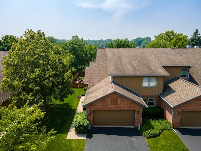 182 Ashley Way, Bloomingdale, IL 60108 - view of front of home featuring a shingled roof, brick siding, and asphalt driveway