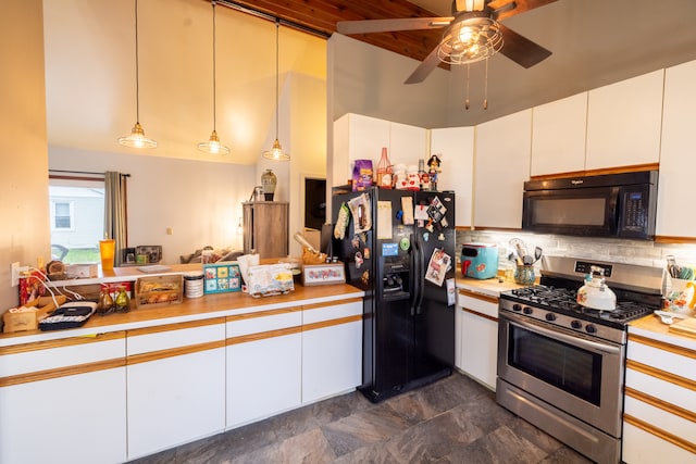 kitchen with tasteful backsplash, ceiling fan, white cabinetry, dark tile floors, and black appliances