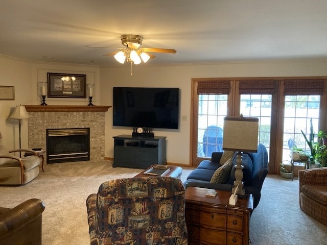 carpeted living room with ceiling fan