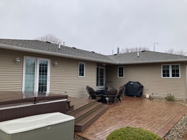 back of property featuring a patio area