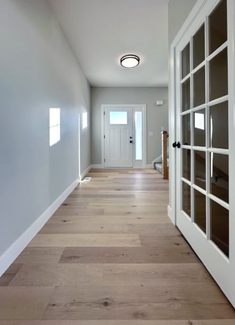 entryway with light hardwood / wood-style flooring