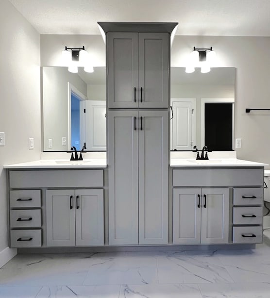 bathroom featuring vanity and tile flooring