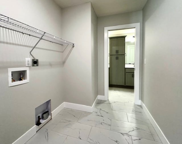 clothes washing area featuring light tile floors, electric dryer hookup, and hookup for a washing machine