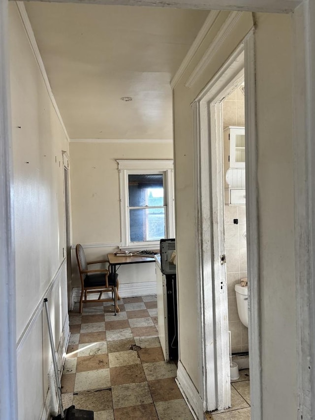 corridor featuring ornamental molding