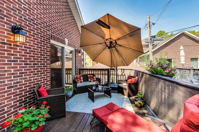 wooden deck with an outdoor hangout area