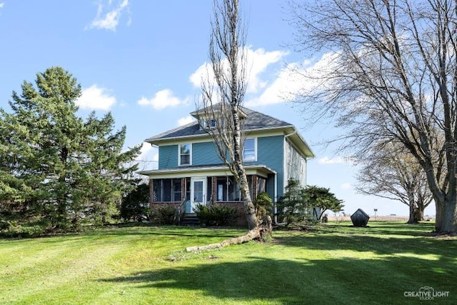 view of front of home with a front yard