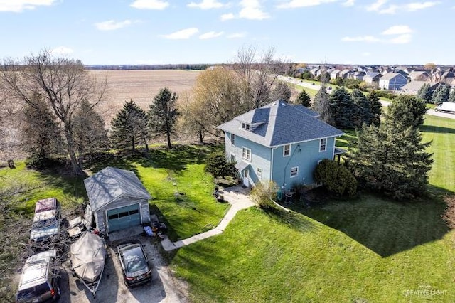 birds eye view of property featuring a rural view