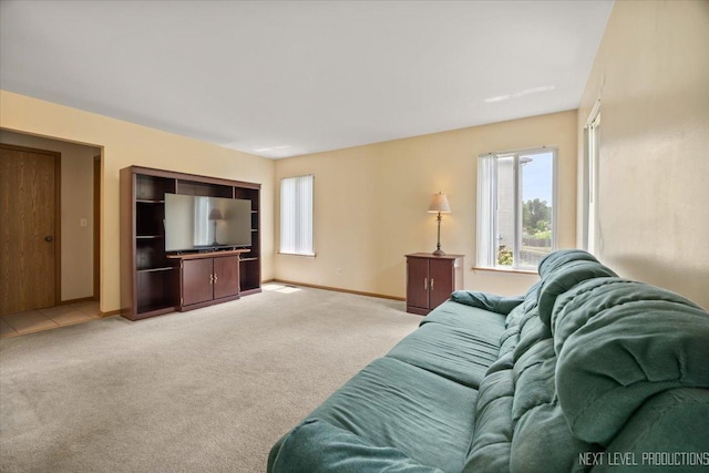 422 Rachel Cir, Romeoville, IL 60446 - living room featuring light colored carpet and baseboards
