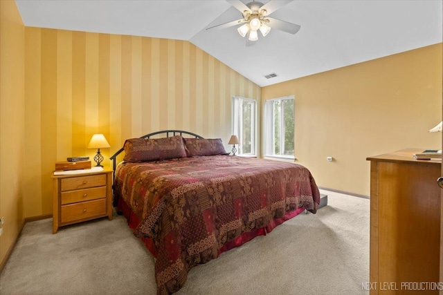 422 Rachel Cir, Romeoville, IL 60446 - bedroom with vaulted ceiling, light carpet, and ceiling fan