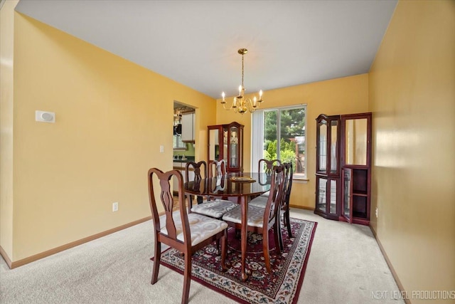 422 Rachel Cir, Romeoville, IL 60446 - dining space featuring light carpet and a chandelier