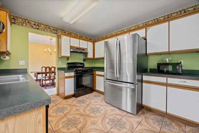 422 Rachel Cir, Romeoville, IL 60446 - kitchen featuring black appliances, under cabinet range hood, a chandelier, white cabinets, and dark countertops