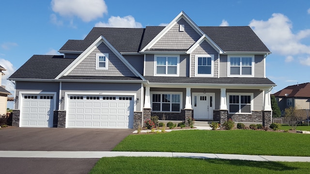 craftsman-style home featuring a front yard