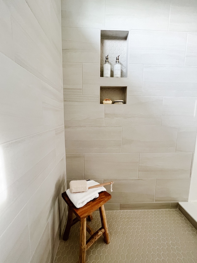 bathroom with tile flooring