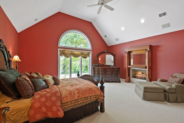 bedroom featuring multiple windows, carpet floors, and ceiling fan