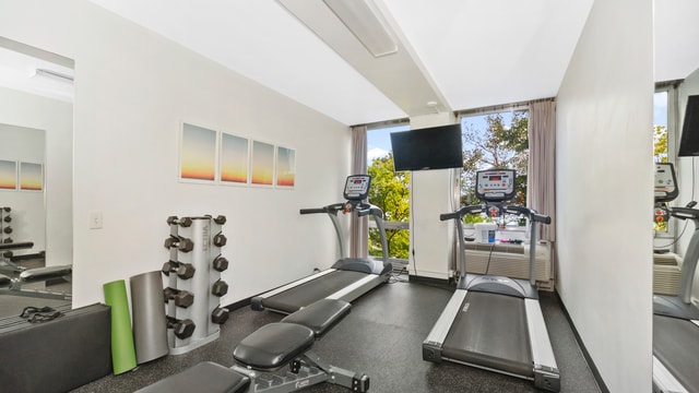 exercise room with a wall of windows