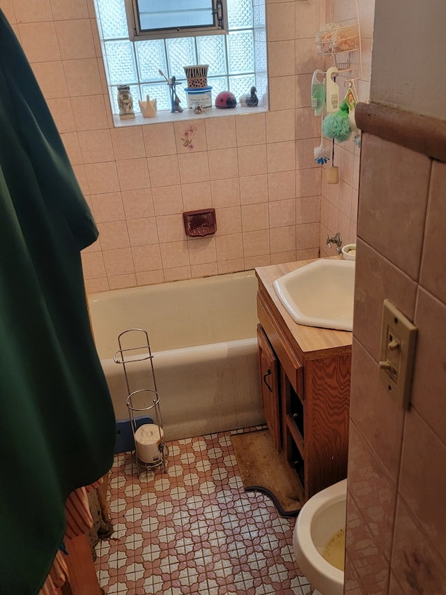 full bathroom featuring shower / bath combo, toilet, tile floors, and vanity