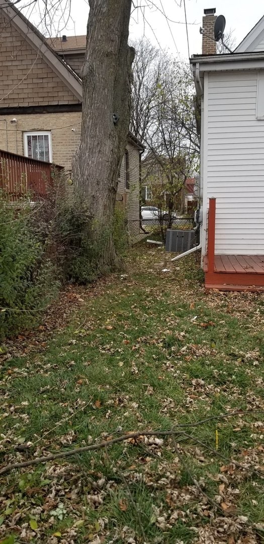 view of yard featuring central AC