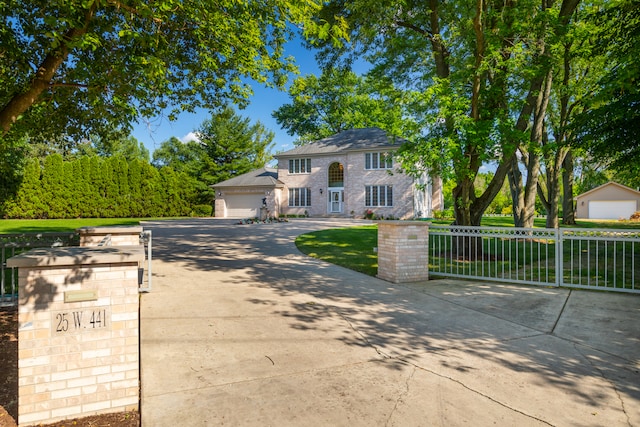 view of front of property with a garage