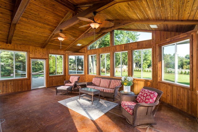 sunroom featuring wooden ceiling, a wealth of natural light, ceiling fan, and vaulted ceiling with beams