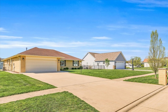 single story home with a garage and a front yard