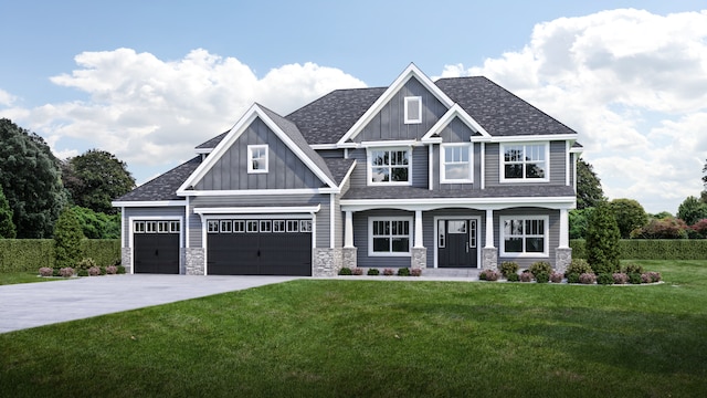 craftsman-style home featuring a garage and a front lawn