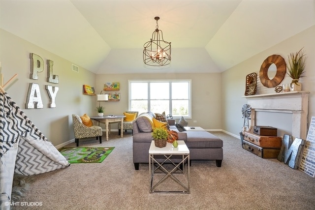 living room with light carpet, vaulted ceiling, and a chandelier