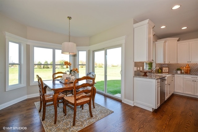 dining room featuring dark wood-type flooring