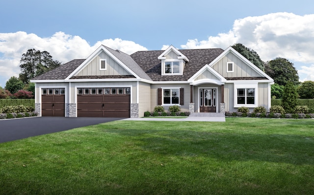 craftsman-style house featuring a garage and a front yard