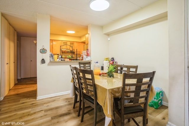 dining area featuring light hardwood / wood-style floors