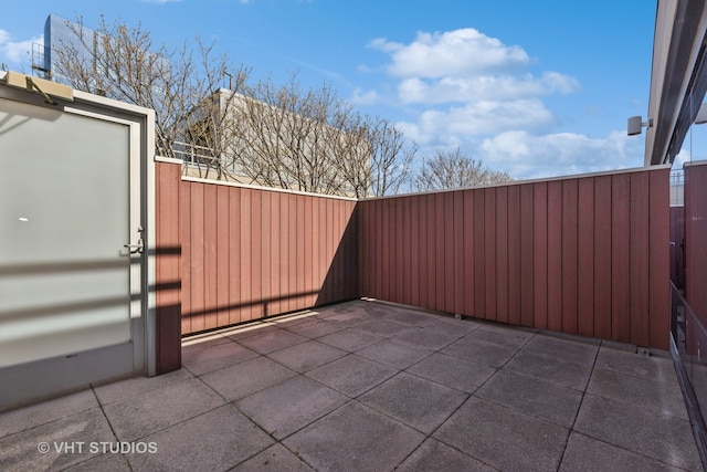 view of patio with fence