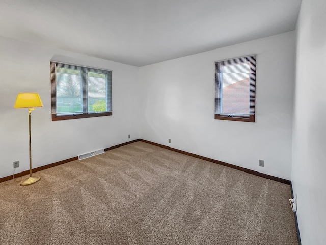 view of carpeted spare room