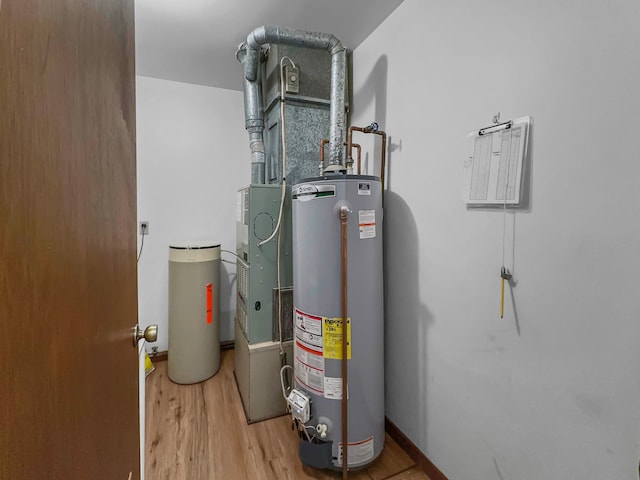 utility room with water heater