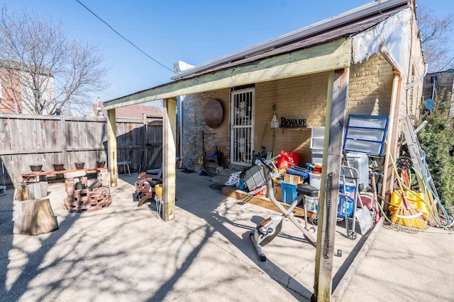 rear view of house with a patio