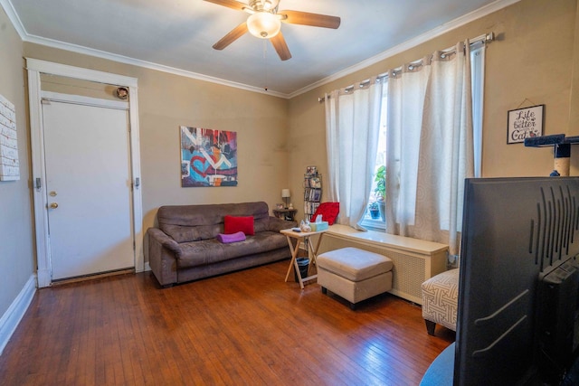 living room with ceiling fan, crown molding, and dark wood-type flooring