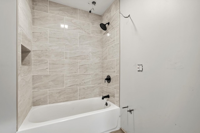 bathroom with washtub / shower combination