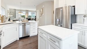 kitchen with stainless steel appliances and white cabinetry