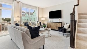 living room with light colored carpet