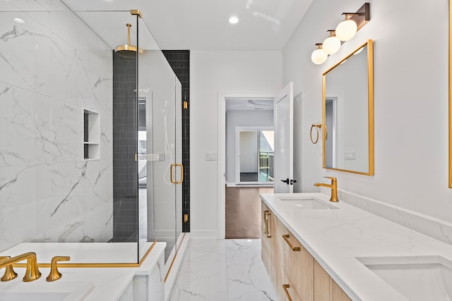 bathroom featuring tile flooring, oversized vanity, an enclosed shower, and dual sinks