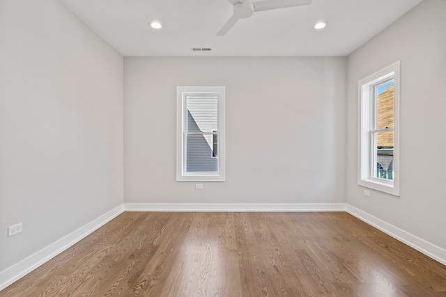 unfurnished room featuring wood-type flooring and ceiling fan