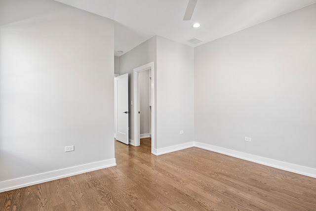 spare room with light wood-type flooring