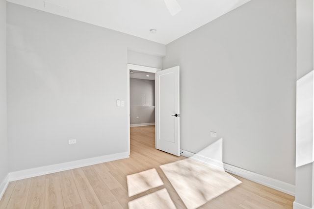 spare room featuring light hardwood / wood-style floors