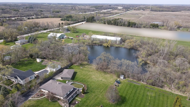 aerial view with a rural view and a water view